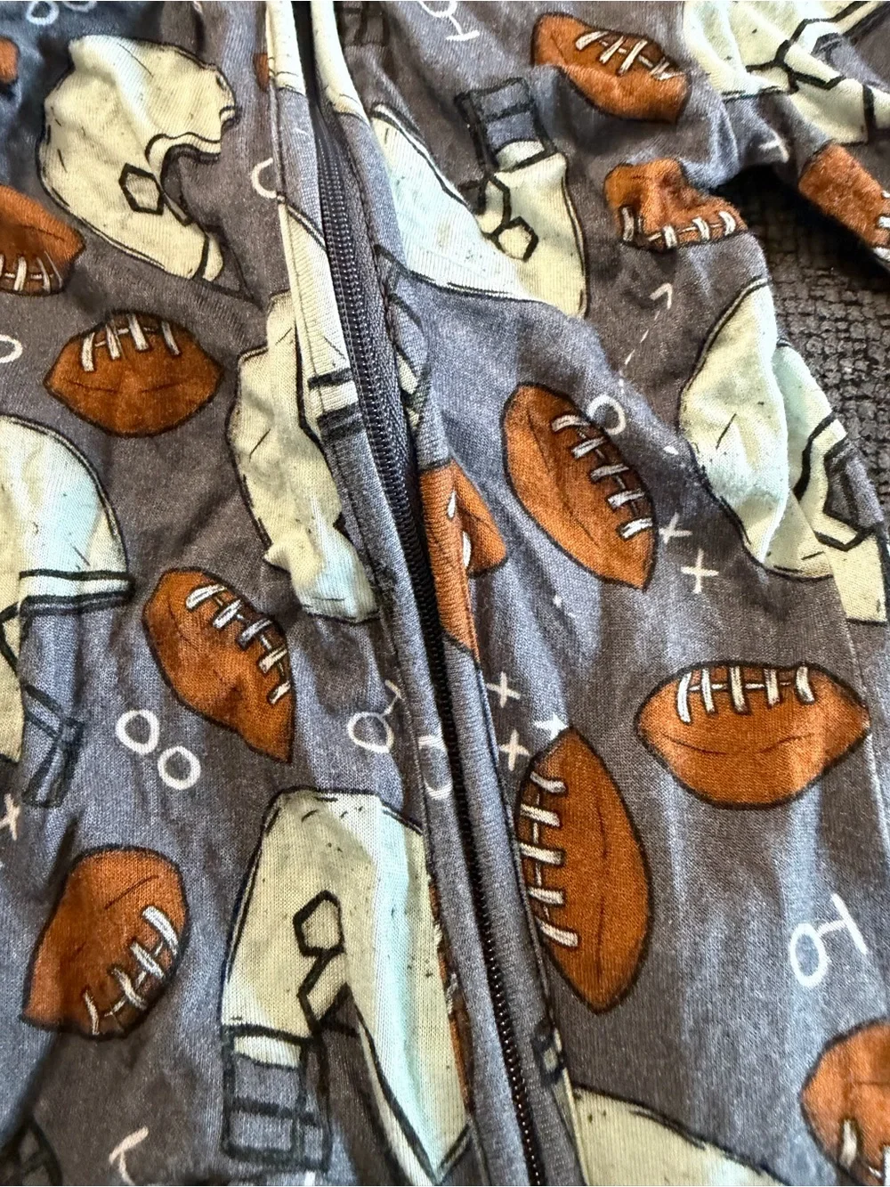 Posh Peanut Gray Football Print Footed One-Piece